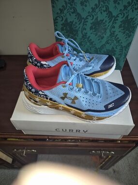 Under Armour Curry Basketball Shoes in Light Blue & Gold